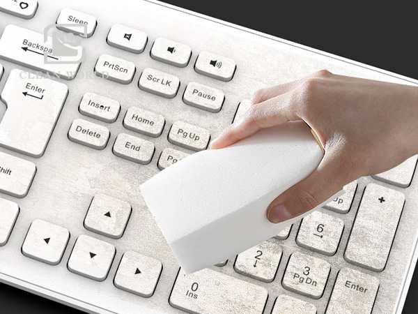 Melamine foam cleaning sponge on keyboard application